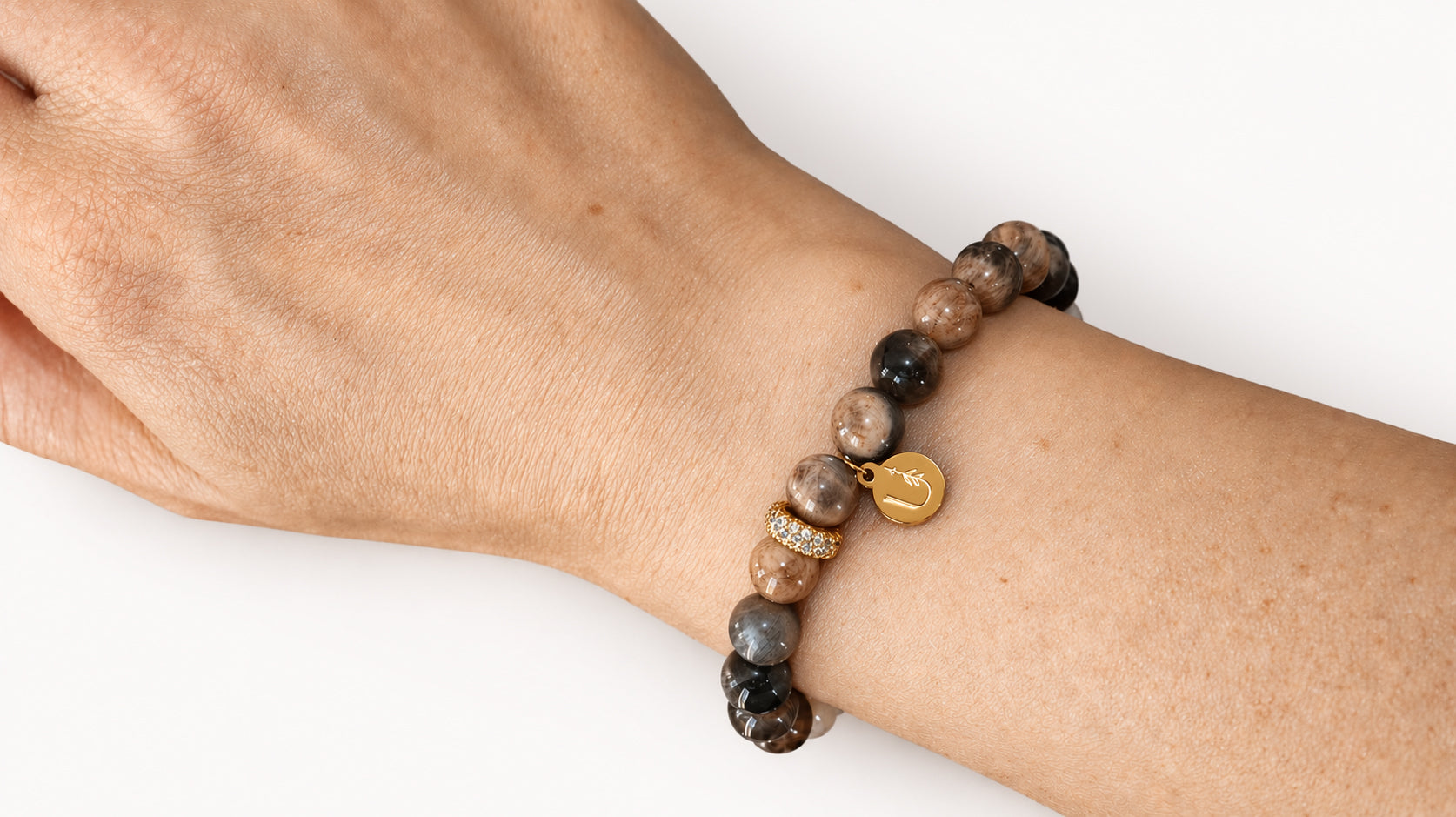 signature bracelet · black sunstone