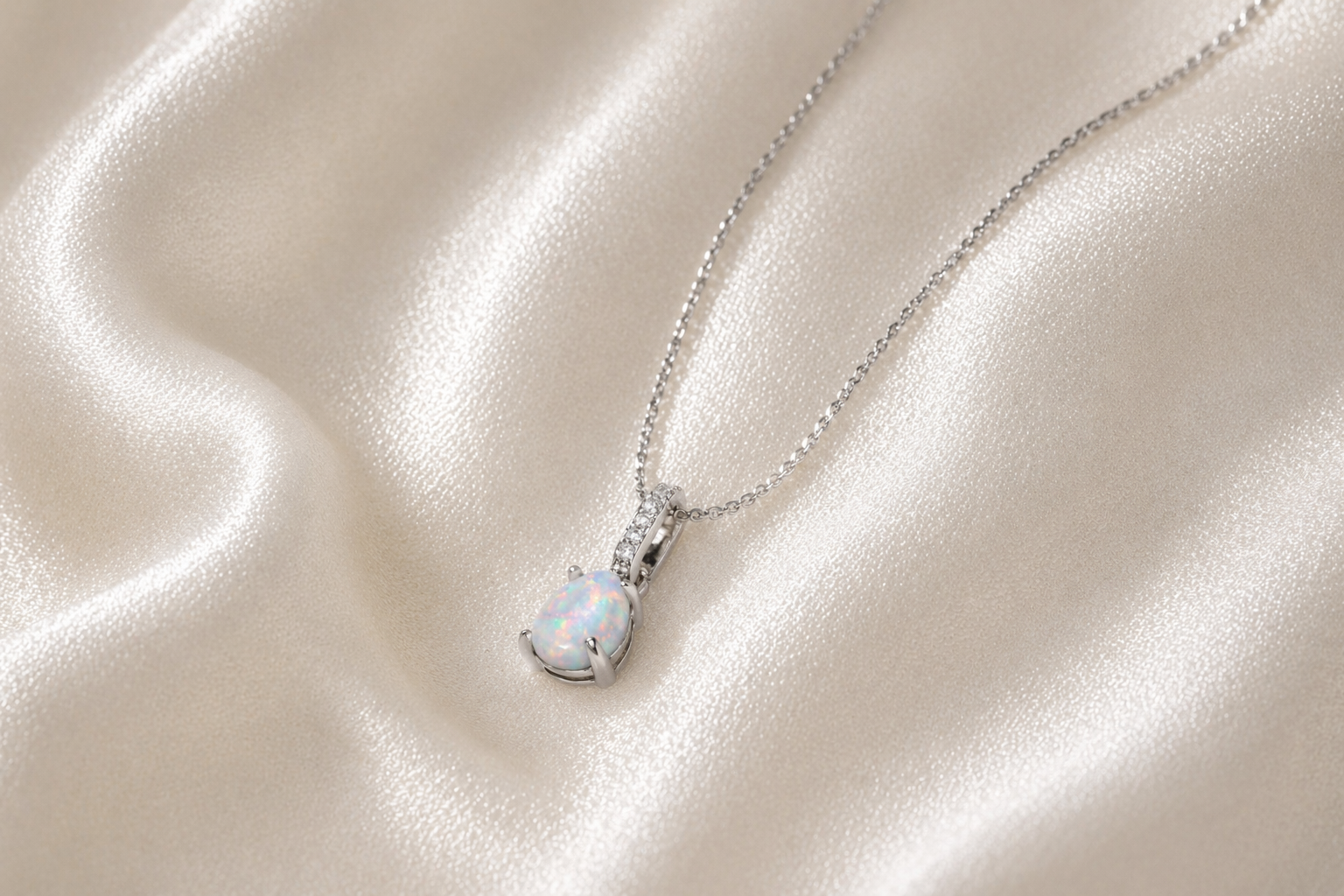 teardrop opal necklace · silver